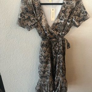 Snakeskin wrap dress with ruffle bottom size L
